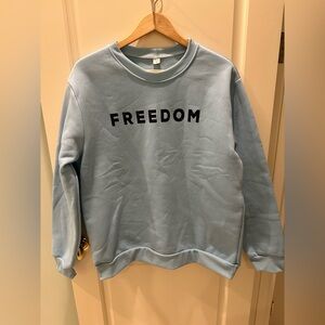 NWOT Light Blue Aqua “FREEDOM" Crewneck Sweatshirt size L, FLAW under left arm